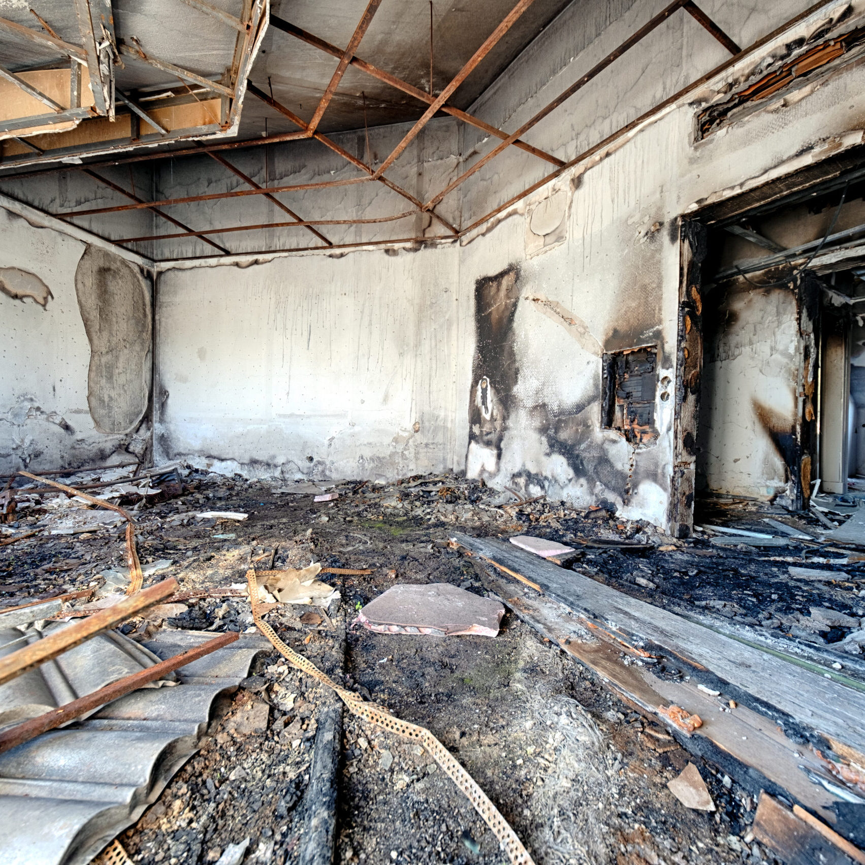 A photo of an old, abandoned building from inside.